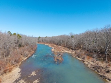 A RIVER RUNS THROUGH IT!!Located approx. 27 mi SE of Waldron on  in Arkansas - for sale on GolfHomes.com, golf home, golf lot