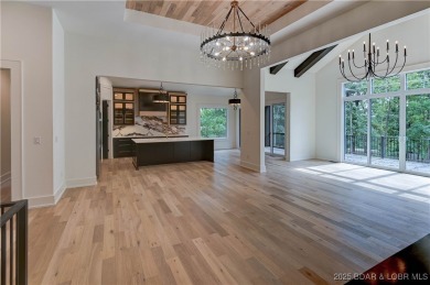 Stunning New Construction Reverse 1.5 Story Modern Farmhouse on The Club At Porto Cima in Missouri - for sale on GolfHomes.com, golf home, golf lot