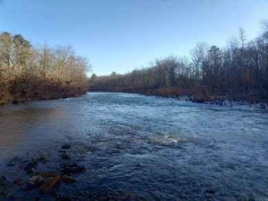 A RIVER RUNS THROUGH IT!!Located approx. 27 mi SE of Waldron on  in Arkansas - for sale on GolfHomes.com, golf home, golf lot