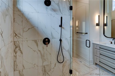 Stunning New Construction Reverse 1.5 Story Modern Farmhouse on The Club At Porto Cima in Missouri - for sale on GolfHomes.com, golf home, golf lot