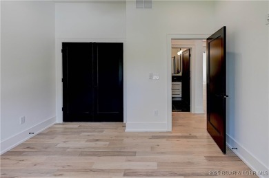 Stunning New Construction Reverse 1.5 Story Modern Farmhouse on The Club At Porto Cima in Missouri - for sale on GolfHomes.com, golf home, golf lot