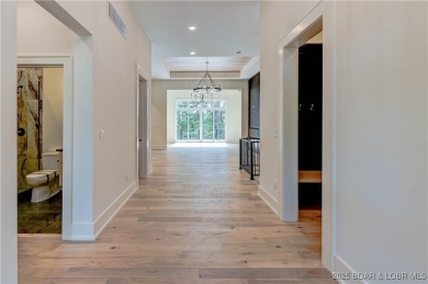 Stunning New Construction Reverse 1.5 Story Modern Farmhouse on The Club At Porto Cima in Missouri - for sale on GolfHomes.com, golf home, golf lot