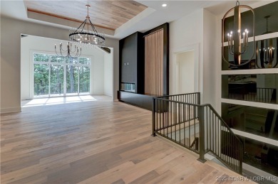 Stunning New Construction Reverse 1.5 Story Modern Farmhouse on The Club At Porto Cima in Missouri - for sale on GolfHomes.com, golf home, golf lot