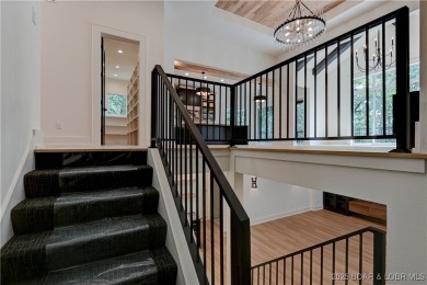 Stunning New Construction Reverse 1.5 Story Modern Farmhouse on The Club At Porto Cima in Missouri - for sale on GolfHomes.com, golf home, golf lot