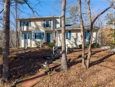 Enjoy seasonal views of Lake Keowee within the desirable full on Keowee Key Golf and Country Club in South Carolina - for sale on GolfHomes.com, golf home, golf lot