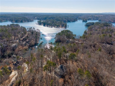 Enjoy seasonal views of Lake Keowee within the desirable full on Keowee Key Golf and Country Club in South Carolina - for sale on GolfHomes.com, golf home, golf lot