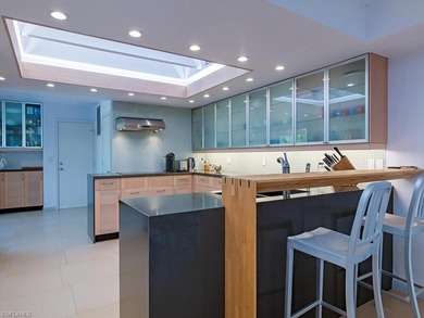 A rare opportunity awaits to own a modern-style villa that lives on Club at Pelican Bay Golf Course in Florida - for sale on GolfHomes.com, golf home, golf lot