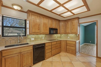 Spacious 4 bed-2.5 bath in Fairway Oaks, right across the street on Abilene Country Club - South Course in Texas - for sale on GolfHomes.com, golf home, golf lot