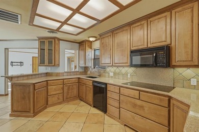 Spacious 4 bed-2.5 bath in Fairway Oaks, right across the street on Abilene Country Club - South Course in Texas - for sale on GolfHomes.com, golf home, golf lot