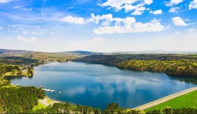 Discover this higher-elevation, corner-lot-adjacent property on The Highlands Course at Lake Arrowhead in Georgia - for sale on GolfHomes.com, golf home, golf lot