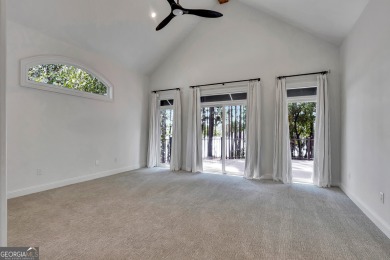 LAKEFRONT LIVING with over 180' of Lake Kedron views and on Canongate At Flat Creek Club in Georgia - for sale on GolfHomes.com, golf home, golf lot