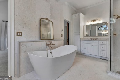LAKEFRONT LIVING with over 180' of Lake Kedron views and on Canongate At Flat Creek Club in Georgia - for sale on GolfHomes.com, golf home, golf lot