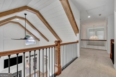 LAKEFRONT LIVING with over 180' of Lake Kedron views and on Canongate At Flat Creek Club in Georgia - for sale on GolfHomes.com, golf home, golf lot