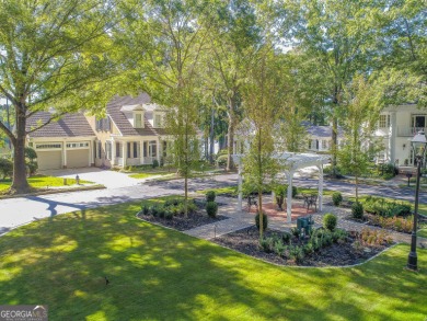 LAKEFRONT LIVING with over 180' of Lake Kedron views and on Canongate At Flat Creek Club in Georgia - for sale on GolfHomes.com, golf home, golf lot