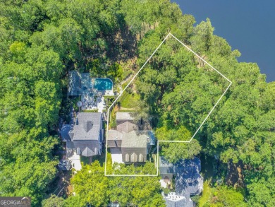 LAKEFRONT LIVING with over 180' of Lake Kedron views and on Canongate At Flat Creek Club in Georgia - for sale on GolfHomes.com, golf home, golf lot