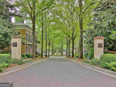 LAKEFRONT LIVING with over 180' of Lake Kedron views and on Canongate At Flat Creek Club in Georgia - for sale on GolfHomes.com, golf home, golf lot
