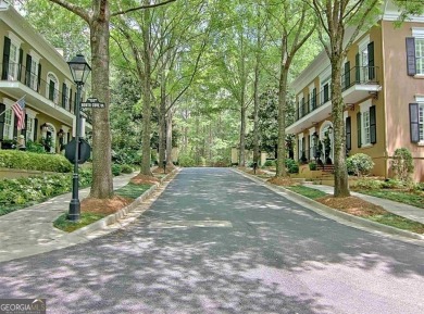 LAKEFRONT LIVING with over 180' of Lake Kedron views and on Canongate At Flat Creek Club in Georgia - for sale on GolfHomes.com, golf home, golf lot