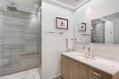 Extensively renovated and move-in ready 4-bedroom, 5.5-bath on Crandon Golf At Key Biscayne in Florida - for sale on GolfHomes.com, golf home, golf lot