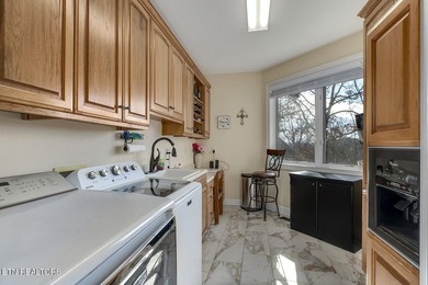 CAPTIVATING VIEWS of Tellico Lake from the Foyer draw you into on Toqua Golf Course - Loudon County in Tennessee - for sale on GolfHomes.com, golf home, golf lot