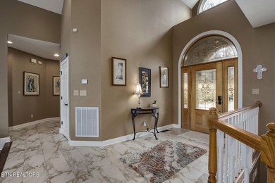 CAPTIVATING VIEWS of Tellico Lake from the Foyer draw you into on Toqua Golf Course - Loudon County in Tennessee - for sale on GolfHomes.com, golf home, golf lot