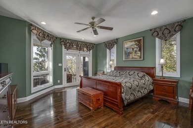 CAPTIVATING VIEWS of Tellico Lake from the Foyer draw you into on Toqua Golf Course - Loudon County in Tennessee - for sale on GolfHomes.com, golf home, golf lot