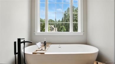 Custom-built ranch home in the sought-after Brickshire golf on Brickshire Golf Club in Virginia - for sale on GolfHomes.com, golf home, golf lot