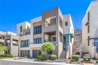 Experience elevated living in this stunning 3-story modern on Dragon Ridge Country Club in Nevada - for sale on GolfHomes.com, golf home, golf lot