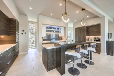 Experience elevated living in this stunning 3-story modern on Dragon Ridge Country Club in Nevada - for sale on GolfHomes.com, golf home, golf lot
