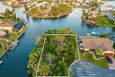 Ready to build on waterfront 0.30 acre lot featuring a fully on Palm Harbor Golf Club in Florida - for sale on GolfHomes.com, golf home, golf lot