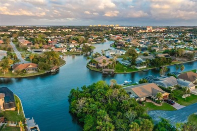 Ready to build on waterfront 0.30 acre lot featuring a fully on Palm Harbor Golf Club in Florida - for sale on GolfHomes.com, golf home, golf lot