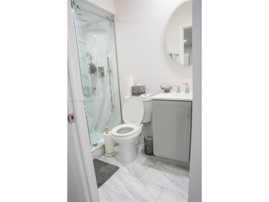 Leave the snow behind and enjoy the sunshine in this beautifully on Kings Point Golf -Flanders Way in Florida - for sale on GolfHomes.com, golf home, golf lot