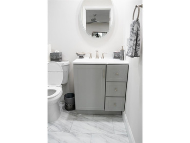 Leave the snow behind and enjoy the sunshine in this beautifully on Kings Point Golf -Flanders Way in Florida - for sale on GolfHomes.com, golf home, golf lot