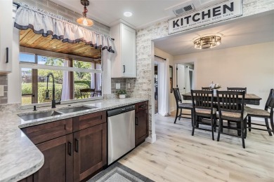 Under contract-accepting backup offers. Welcome to your dream on Countryside Country Club in Florida - for sale on GolfHomes.com, golf home, golf lot