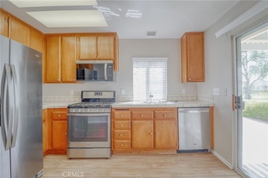 This charming home nestled in a desirable 55+ community, offers on Sun Lakes Country Club in California - for sale on GolfHomes.com, golf home, golf lot