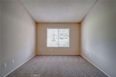 This charming home nestled in a desirable 55+ community, offers on Sun Lakes Country Club in California - for sale on GolfHomes.com, golf home, golf lot