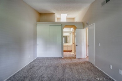 This charming home nestled in a desirable 55+ community, offers on Sun Lakes Country Club in California - for sale on GolfHomes.com, golf home, golf lot