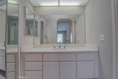 This charming home nestled in a desirable 55+ community, offers on Sun Lakes Country Club in California - for sale on GolfHomes.com, golf home, golf lot