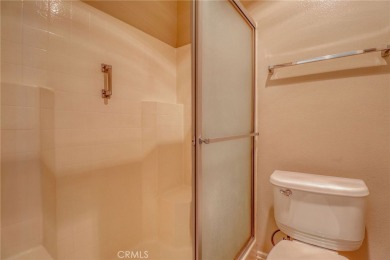 This charming home nestled in a desirable 55+ community, offers on Sun Lakes Country Club in California - for sale on GolfHomes.com, golf home, golf lot