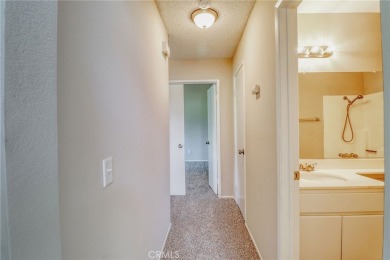 This charming home nestled in a desirable 55+ community, offers on Sun Lakes Country Club in California - for sale on GolfHomes.com, golf home, golf lot