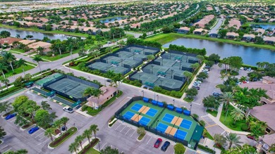 Leave the snow behind and enjoy the sunshine in this beautifully on Kings Point Golf -Flanders Way in Florida - for sale on GolfHomes.com, golf home, golf lot