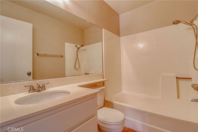 This charming home nestled in a desirable 55+ community, offers on Sun Lakes Country Club in California - for sale on GolfHomes.com, golf home, golf lot