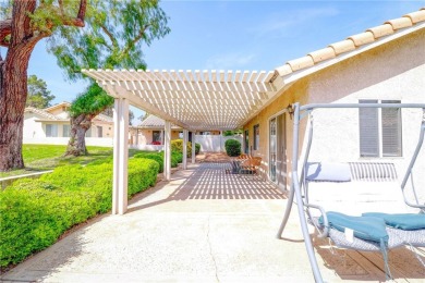 This charming home nestled in a desirable 55+ community, offers on Sun Lakes Country Club in California - for sale on GolfHomes.com, golf home, golf lot