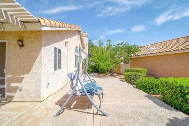 This charming home nestled in a desirable 55+ community, offers on Sun Lakes Country Club in California - for sale on GolfHomes.com, golf home, golf lot