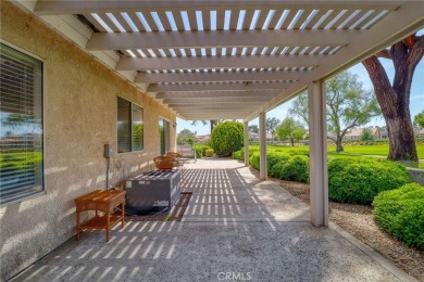 This charming home nestled in a desirable 55+ community, offers on Sun Lakes Country Club in California - for sale on GolfHomes.com, golf home, golf lot