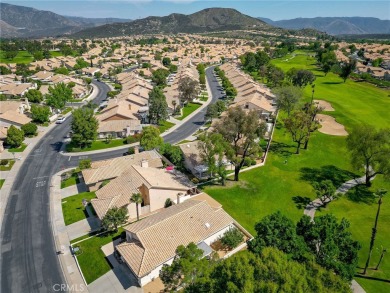 This charming home nestled in a desirable 55+ community, offers on Sun Lakes Country Club in California - for sale on GolfHomes.com, golf home, golf lot