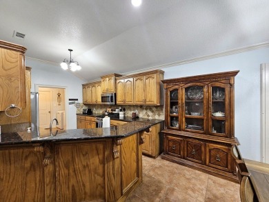 Beautiful 4-bed, 2-bath home just steps from the Andrews County on Andrews County Golf Course in Texas - for sale on GolfHomes.com, golf home, golf lot