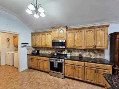 Beautiful 4-bed, 2-bath home just steps from the Andrews County on Andrews County Golf Course in Texas - for sale on GolfHomes.com, golf home, golf lot