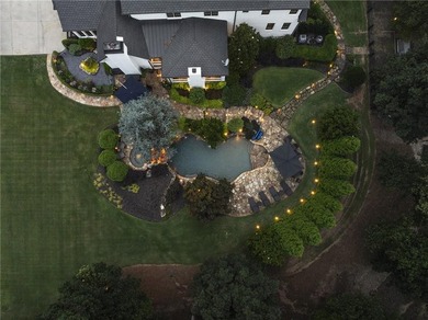 Experience unmatched elegance and modern innovation in this on White Columns Country Club in Georgia - for sale on GolfHomes.com, golf home, golf lot