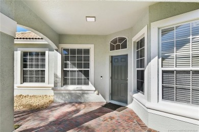 Discover lakefront living in this beautifully updated 3-bedroom on Eagle Marsh Golf Club in Florida - for sale on GolfHomes.com, golf home, golf lot