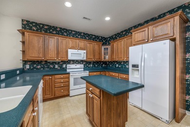 Discover the perfect family retreat in this spacious, one-level on Tidewater Golf Club and Plantation in South Carolina - for sale on GolfHomes.com, golf home, golf lot